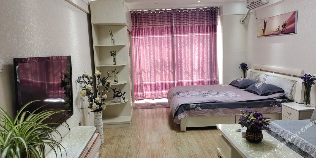 浪漫温情克拉公寓(宝通街高架路1号分店)