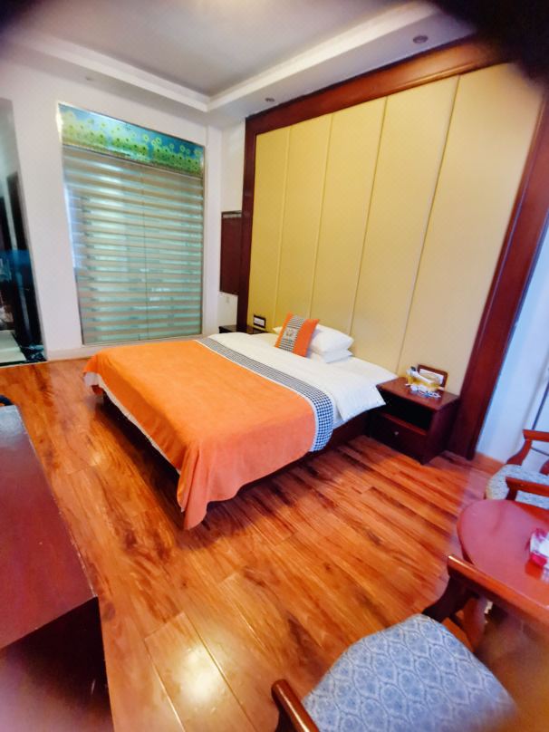 Longhui Hejia Hotel (East Bus Station)