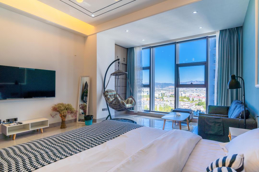 Maitreya July Homestay (Qinglai Park Giant Century Square Branch)