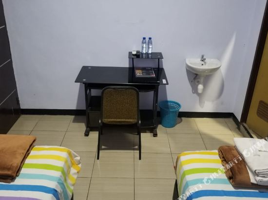 JC Homestay Jember - Tap to explore photos