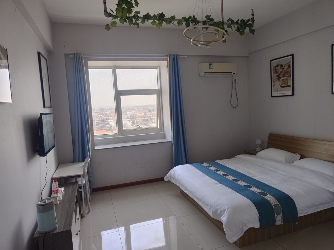 Yihao Homestay (Laiyang Longmen Xi Road Ruifeng Dasha)