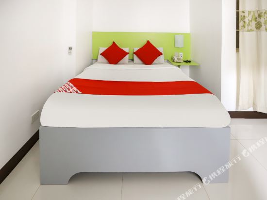 OYO 210 Apple Tree Suites - Tap to explore photos
