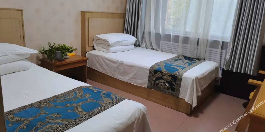 阳光旅馆(兴国镇解放北路社区卫生服务站南)