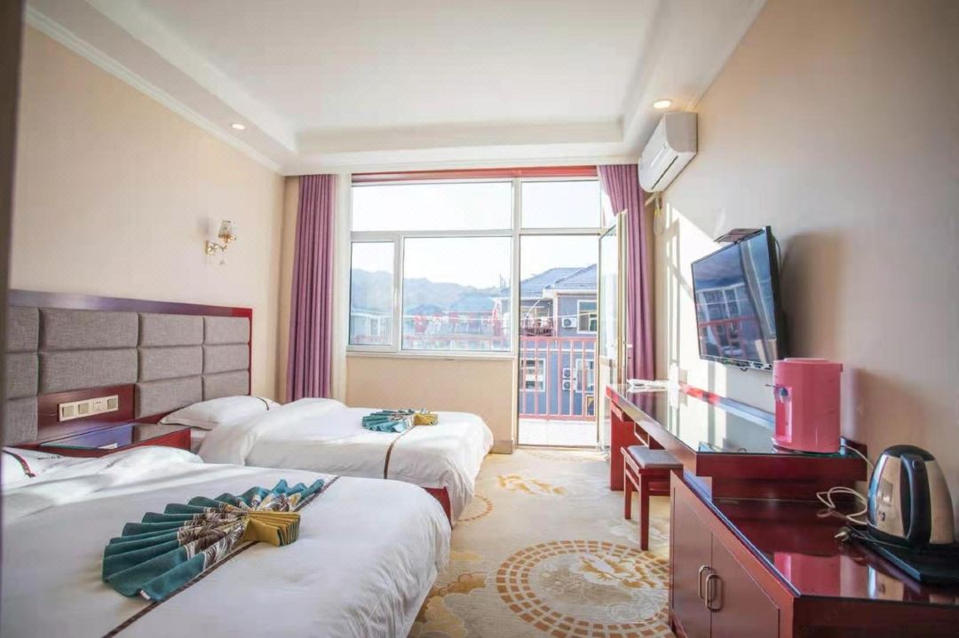 Xinyue Hotel (Qicai Danxia)