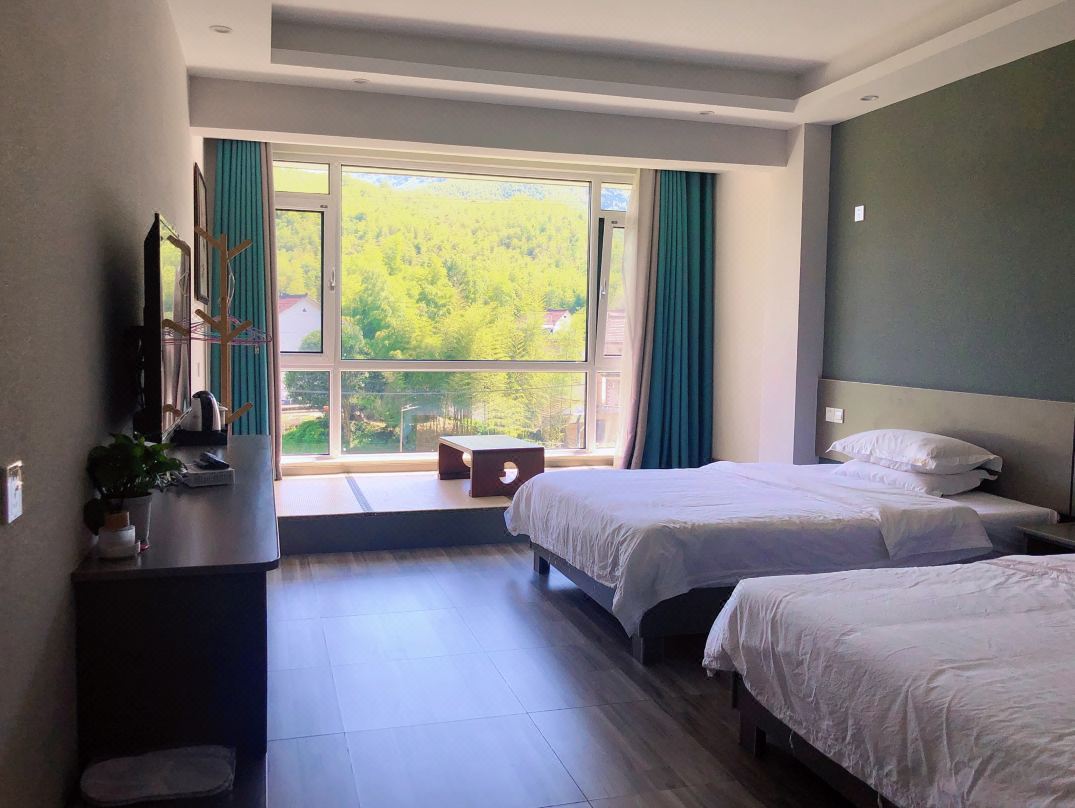 Jingxian Huisu Qiaojia B&B (Moon Bay Branch)