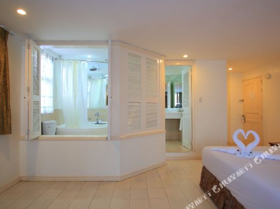 Wild Orchid Beach Resort - Tap to explore photos