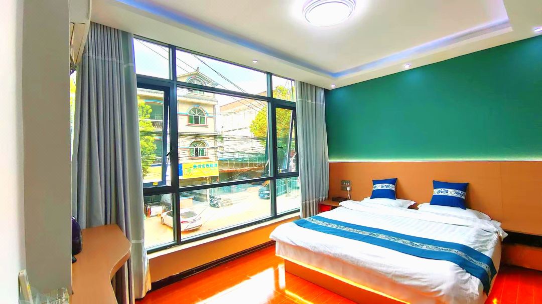 Qimo Business Hotel