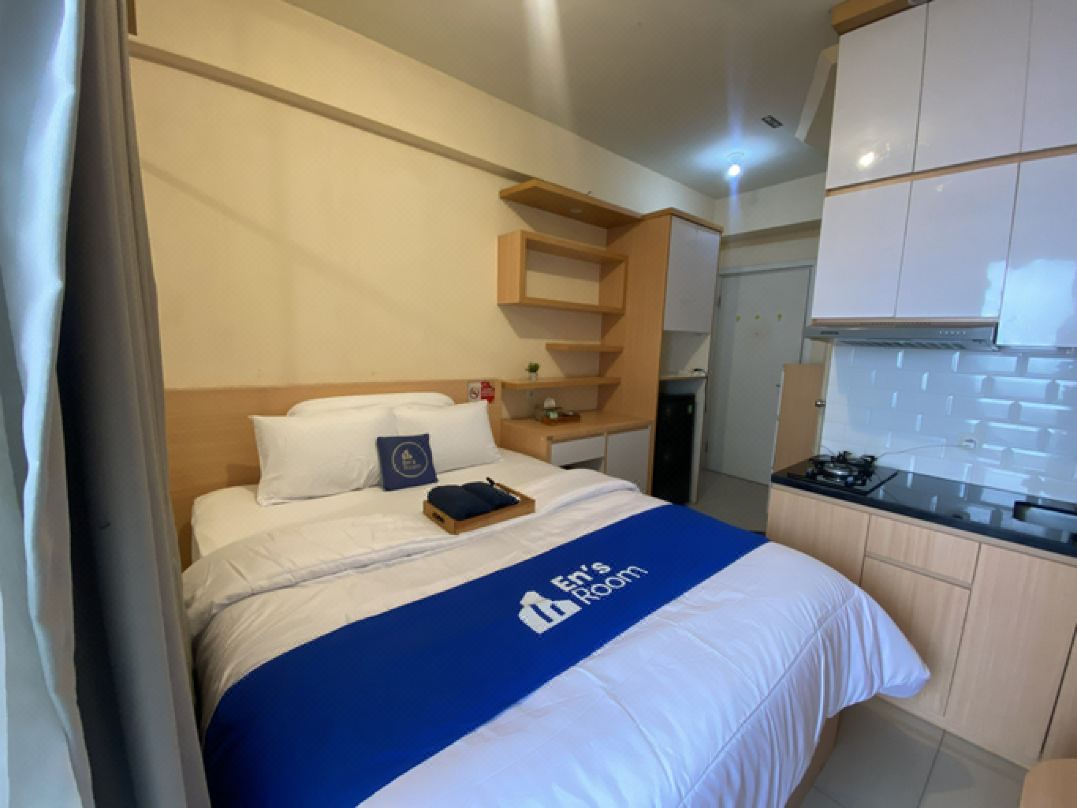 Apartemen Green Pramuka City by EnsRoom
