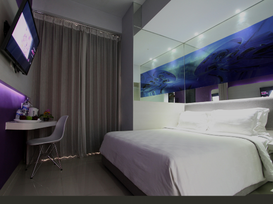 G Suites Hotel by AMITHYA - Tap to explore photos