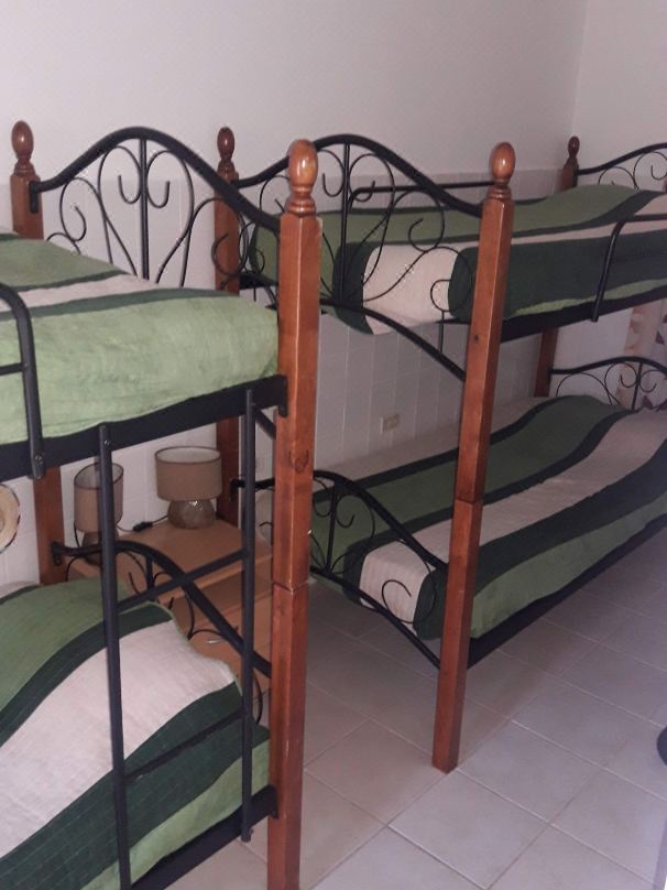 WEAVING MILL ARUBA HOSTEL 床和咖啡