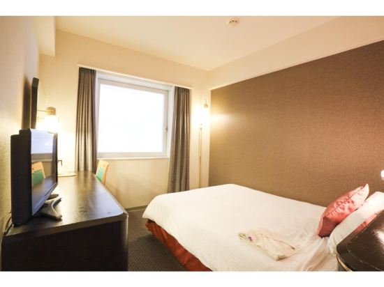 Smile Hotel Naha City Resort - Tap to explore photos