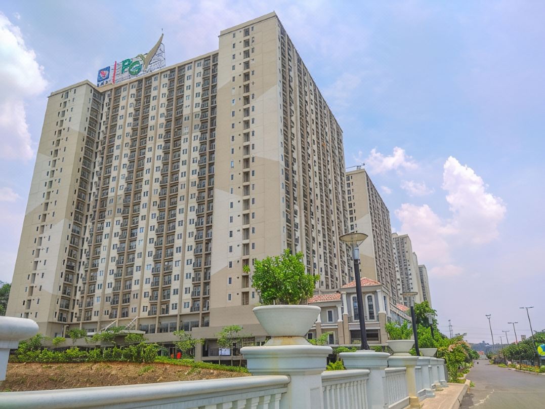 2Br Corner with South and East View at Podomoro Golf View Apartment by Travelio
