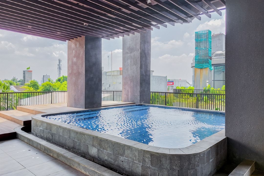 Homey Wooden Touch Studio at Ciputra World 2 Apartment By Travelio