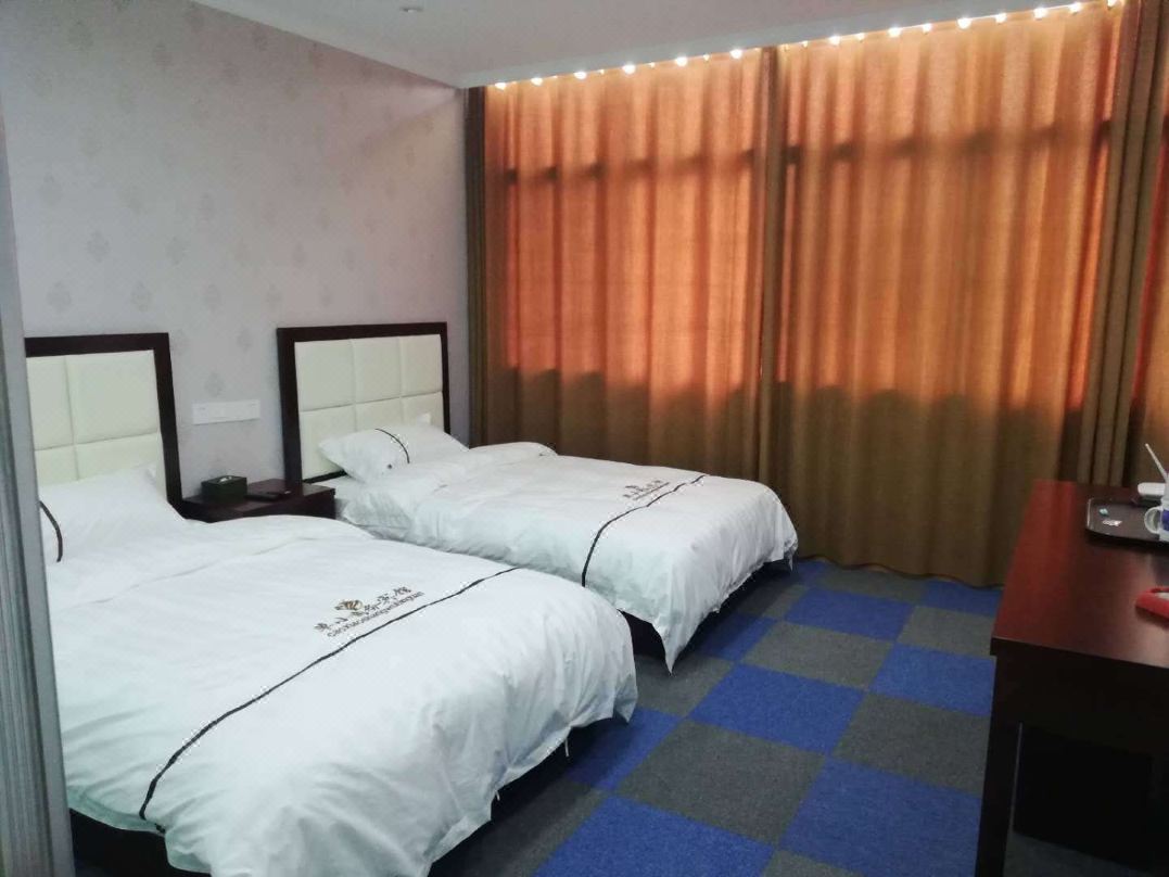 Caoxiao Business Hotel