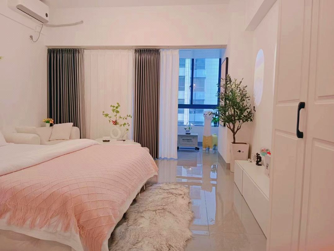 Xinzhi Yuan Apartment (Jinjiang Baolong Plaza)