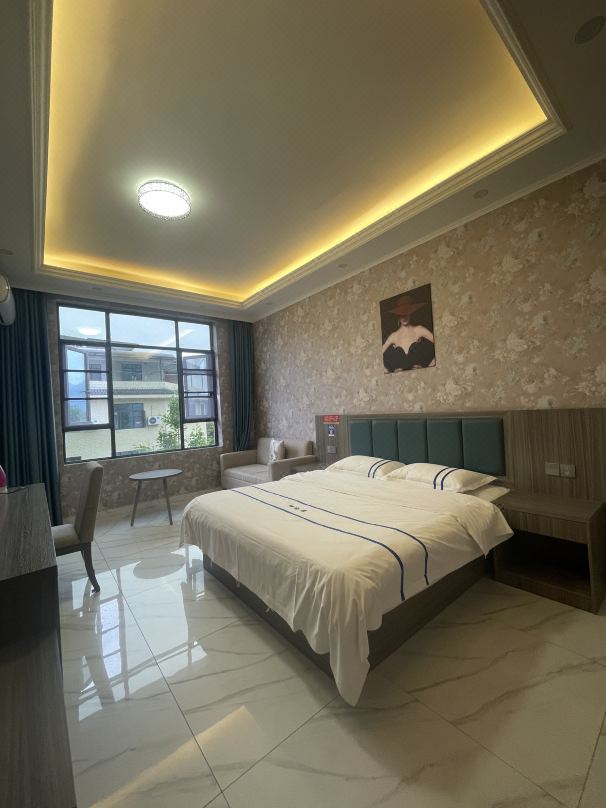Pengzhou Jinshangjing Elevator Homestay