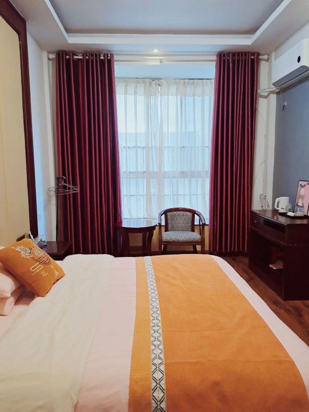 Longhui Hejia Hotel (East Bus Station)