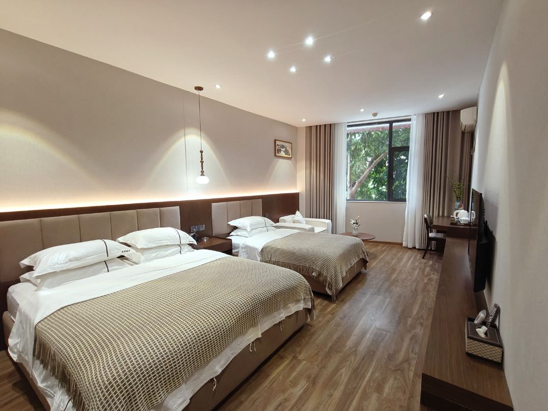 Jinghong Mannong Fengliangdu Fashion Hotel