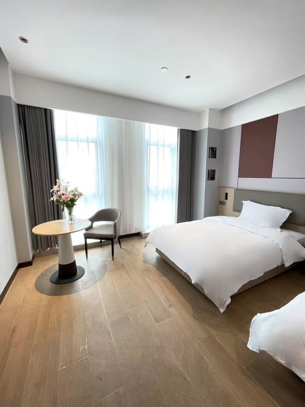 Kaiwo Apartment Hotel (Shanghai Lingang Shuyuan Yuzhou City Plaza)