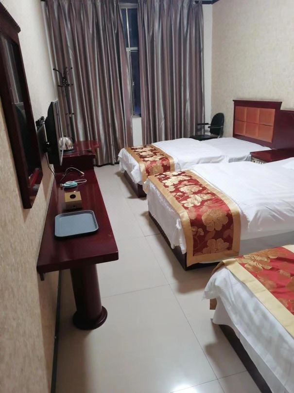 Qujing Kaida Business Hotel (Ruihe East Road Railway Station)