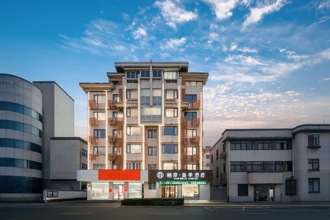 Qian Meiji Hotel (Zhangjiagang High-Speed Railway Station Tangqiao)