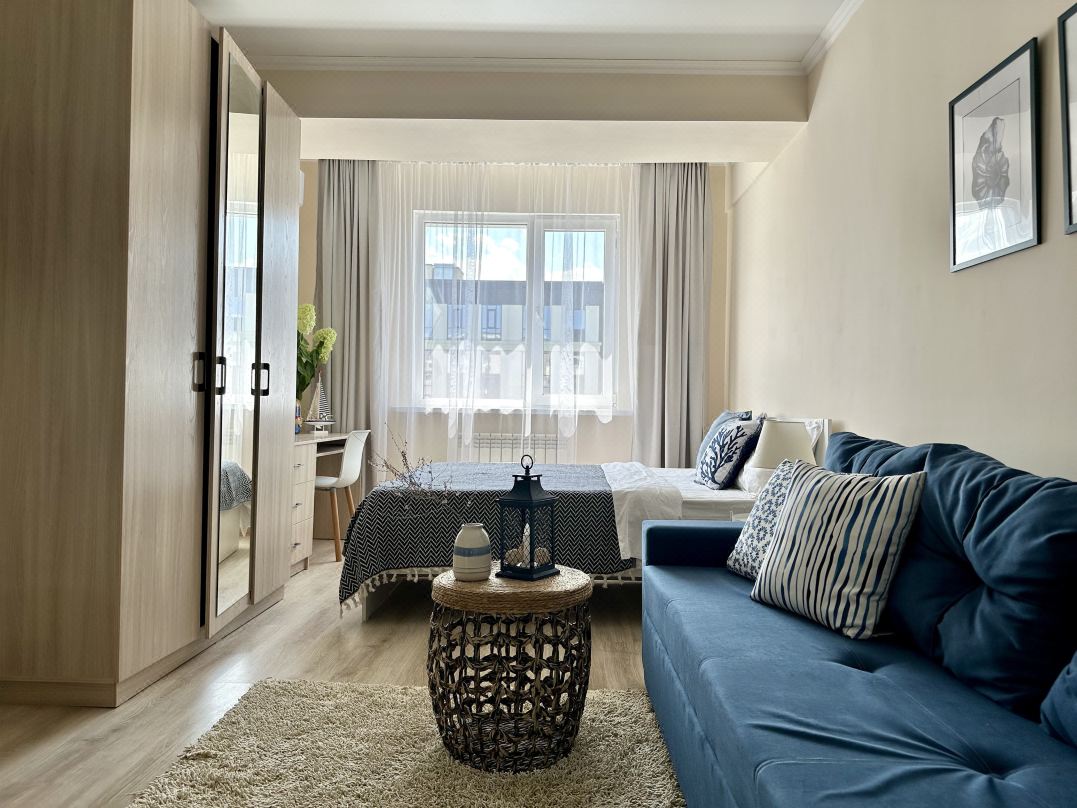 CANCUN apartment with big screen in the center of Almaty