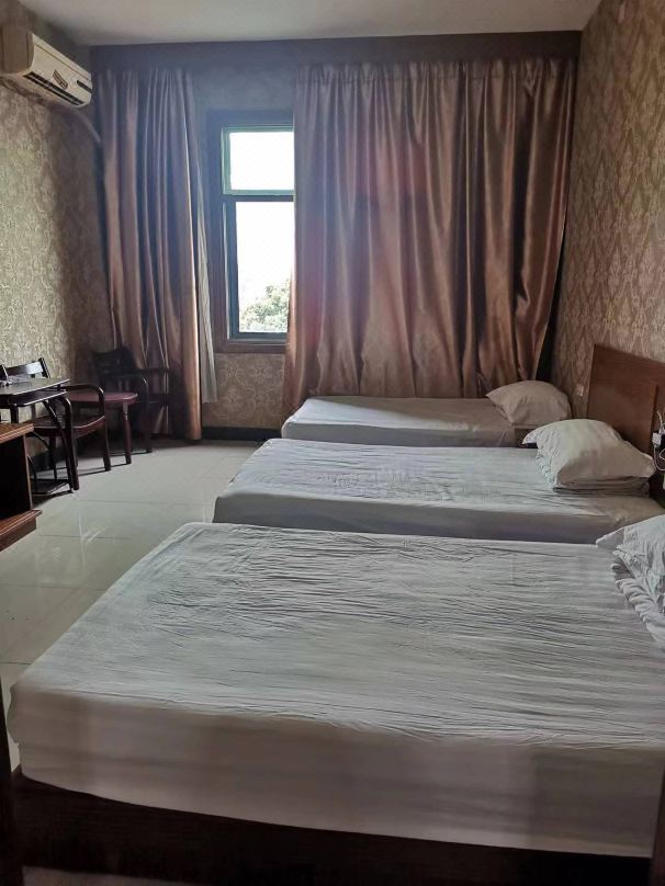 Longyou Jiali Business Hotel