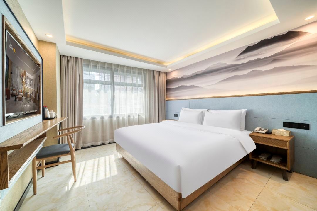 Elong Me Anlai Hotel (Shanghai Zhenping Road Subway Station Guangxin Road)