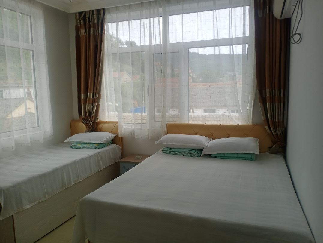 Zhangzi Island Xincheng Inn