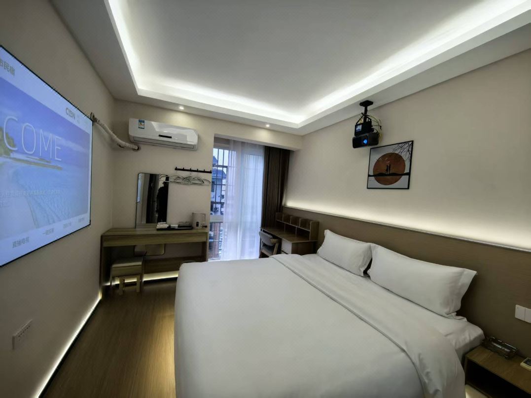 Sanyou City Cinema Guesthouse (Tongren High-Speed Rail Station Tourism Passenger Transport Branch)