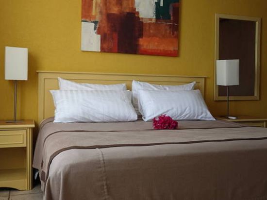 Sunrock Hotel & Suites - Tap to explore photos