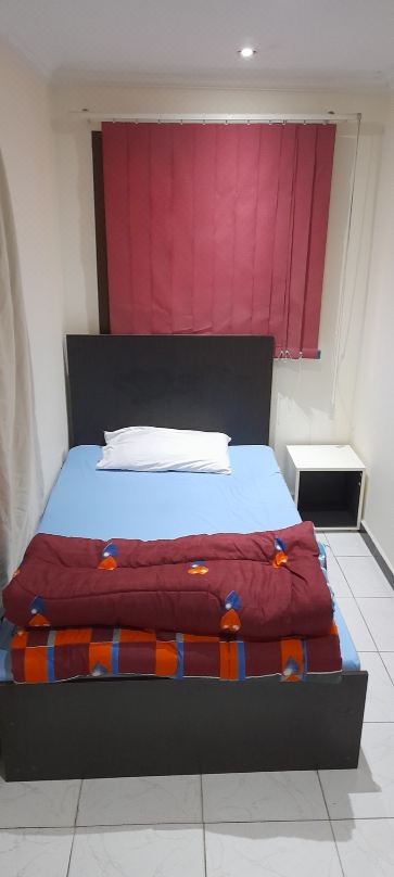 Private-entry rooms in Nasr City near malls, airport & top spots—prime, convenient location in Cairo