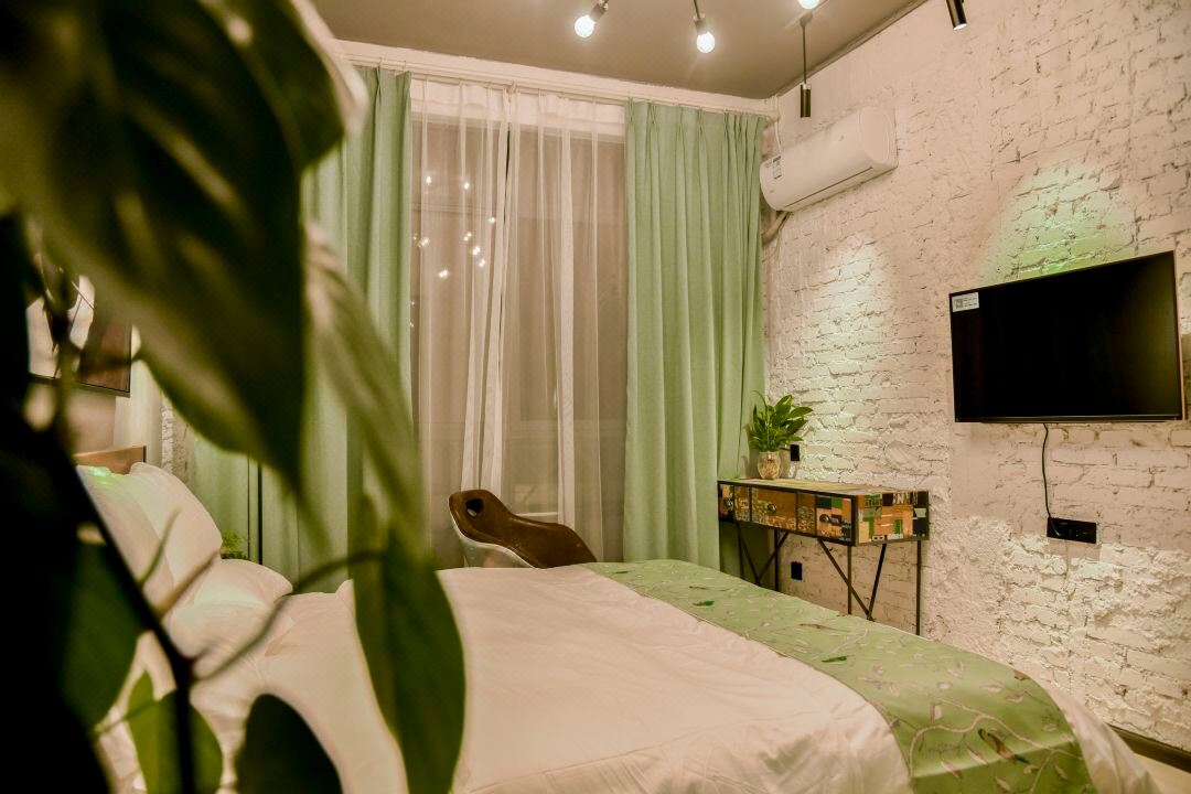 Mengzi Youyou Household Hotel (Honghe Prefecture Government Xintiandi Pedestrian Street Branch)