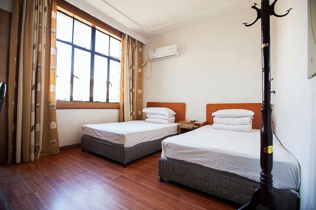 Hualong Hostel (Shanghai Zhelin)