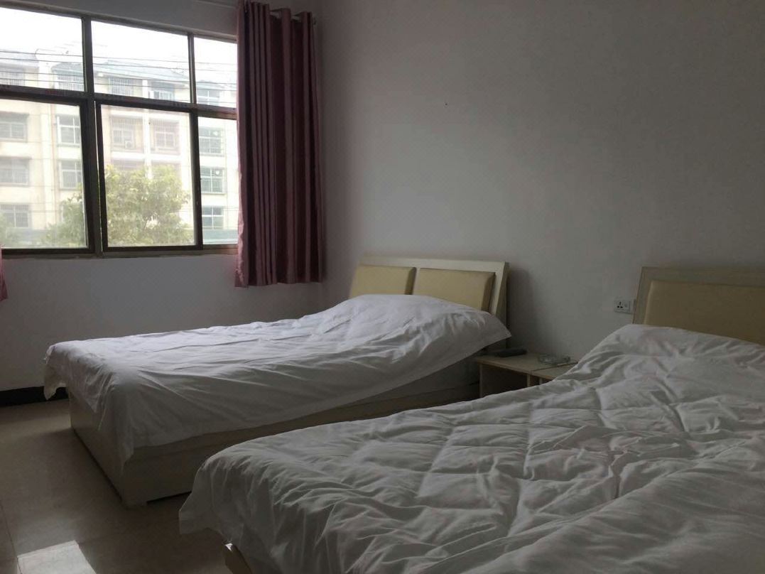 Xinyang Shuxin Hotel