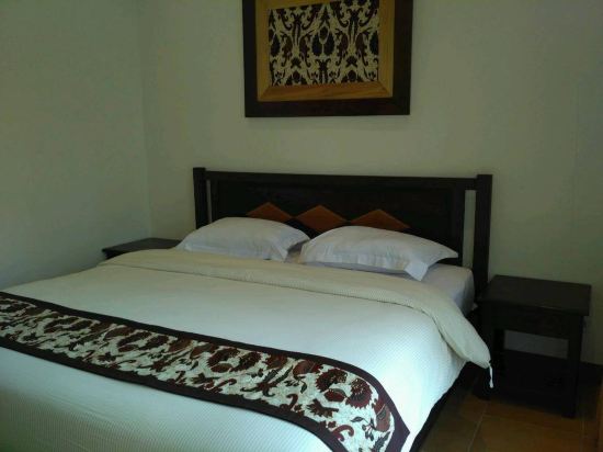 OYO 261 Sasono Putro Guest House - Tap to explore photos
