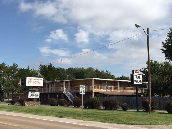 Love Hotels Western Holiday by OYO at Harlan Lake NE - Tap to explore photos
