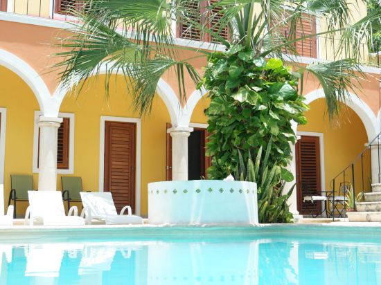 Merida Santiago Hotel Boutique - Tap to explore photos