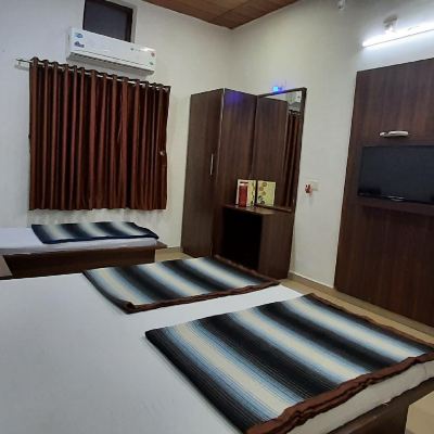 Triple Bed Room With Air Conditioning