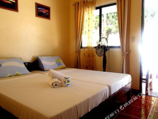 Blue Corals Beach Resort Room Type - Bungalow with Fan Blue Corals Beach Resort Room Type - Bungalow with Fan