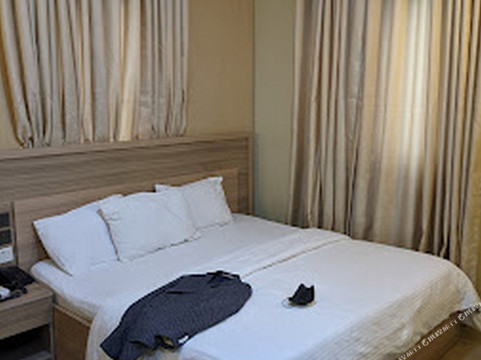 第十一之家酒店与套房