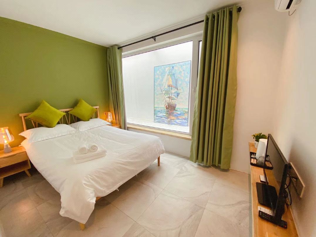 Blue Sky Garden Homestay Youth Hostel (Taidong Pedestrian Street Tsingtao Beer Museum)