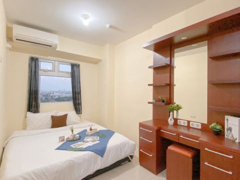 Combined 1BR with Extra Room Apartment at Green Pramuka City By Travelio
