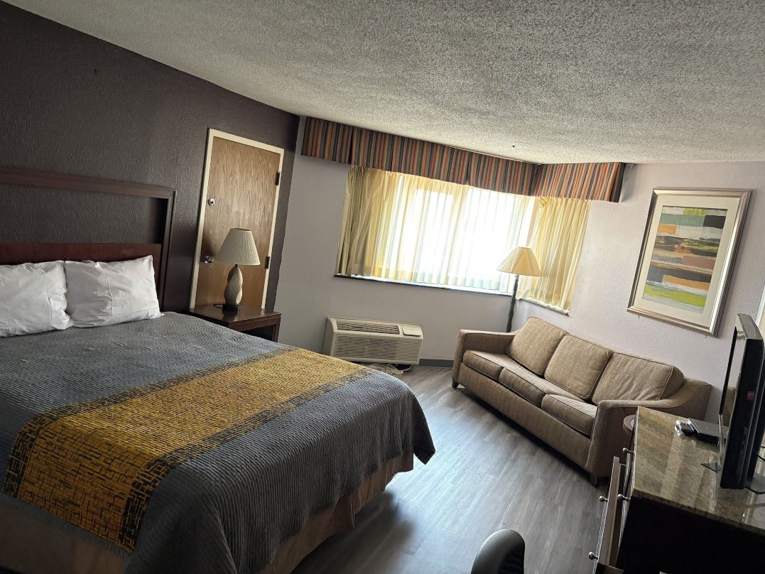 APM Inn & Suites