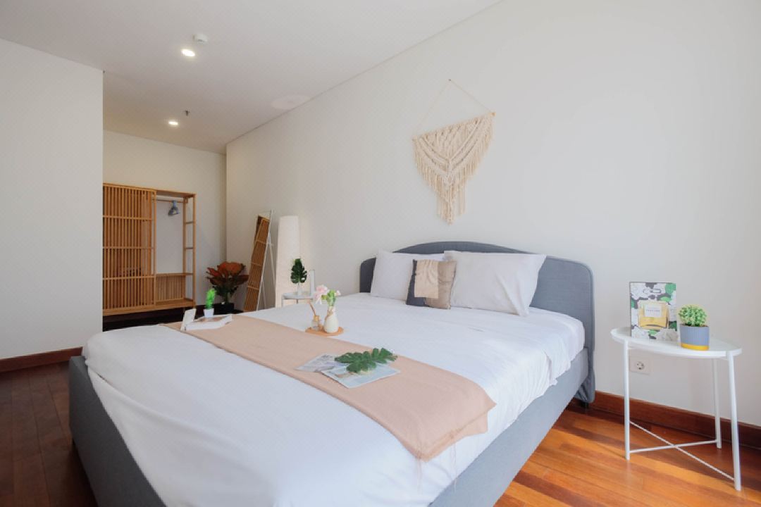 Boho Touch 2BR Apartment with Extra Room at Lucky Tower Residence By Travelio