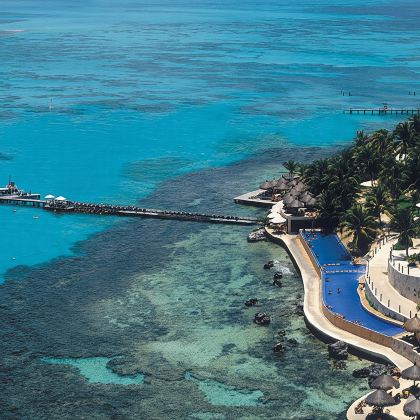 穆赫雷斯岛+女人岛海豚活动中心+女人岛珊瑚礁浮潜乐园一日游