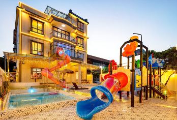 从化空中滑梯亲子9房18床温泉泳池别墅+KTV+麻将+烧烤【别墅内带泳池+温泉入户+独立KTV+麻将+烧烤+空中滑梯+儿童乐园，足不出户即可畅享别墅设施。】