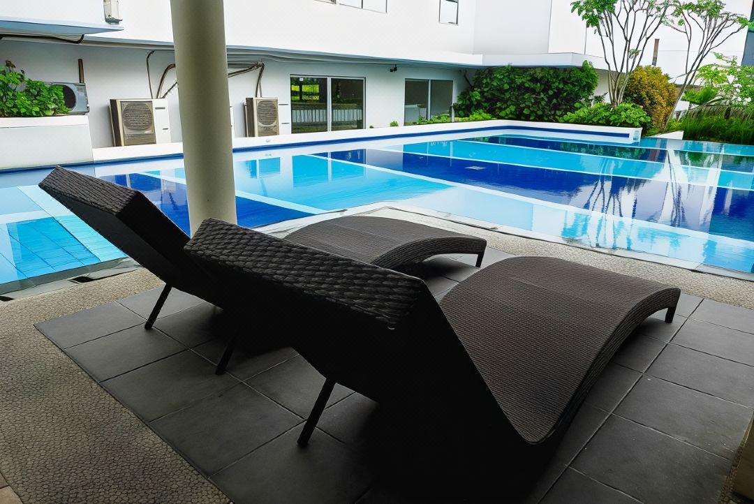 Pool View 2Br with Sofa Bed Bassura City Apartment by Travelio