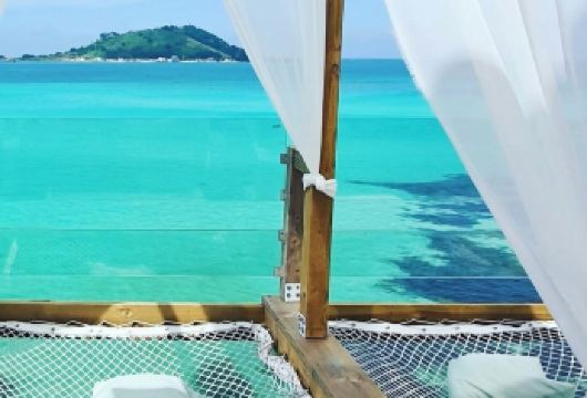 韩国济州市西线一日游【游艇追海豚√挟才休止符√实弹射击√】【D海豚线[ 彩虹公路+挟才海水浴场+M1971豪华游艇追海豚+中文海水浴场/实弹射击+神话世界 ]】