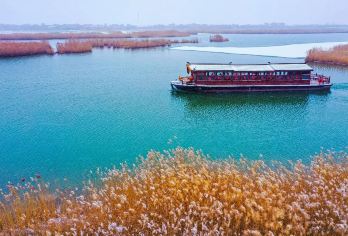 【冬游宁夏】沙湖破冰大船暖锅+镇北堡西部影城一日游【私家团】【沙湖暖冬限定门票+破冰游船+暖锅】